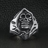Stainless steel grim reaper skull ring on a black leather background.