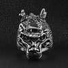 Stainless steel eastern lucky dragon head ring on a black leather background.