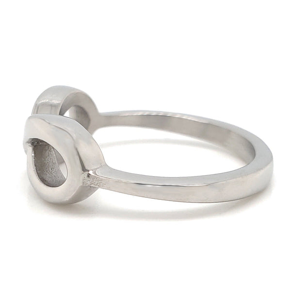 Highly polished infinity stainless steel ring, side view.