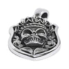 Sterling silver skull shield pendant at an angle.