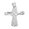Sterling silver filigree cross pendant at an angle.