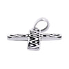 Sterling silver filigree cross pendant at an angle.