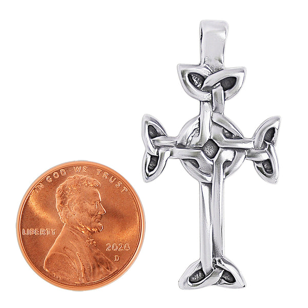 Sterling silver Celtic cross pendant with a penny for scale.