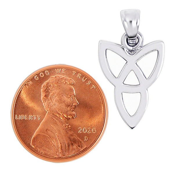 Sterling silver upside down Celtic trinity knot pendant with a penny for scale.