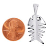 Sterling silver fish bone pendant with a penny for scale.