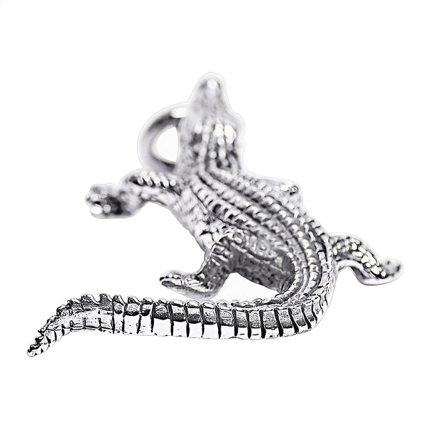Sterling silver alligator pendant at an angle.