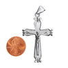 Sterling silver Cross Crucifix pendant with a penny for scale.