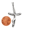 Sterling silver curved Crucifix Cross pendant with a penny for scale.