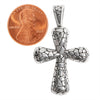 Sterling silver cobblestone Cross pendant with a penny for scale.