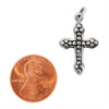 Sterling silver studded Cross pendant with a penny for scale.
