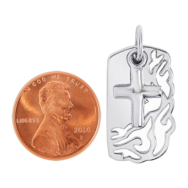 Sterling silver dog tag flame cutout with cross pendant with a penny for scale.