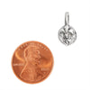 Sterling silver Fleur de Lis pendant with a penny for scale.
