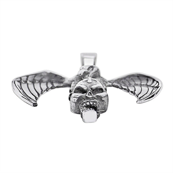 Sterling silver vulture on skull pendant at an angle.