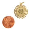 Sterling silver 18K gold PVD Coated "Confirmation" Cross pendant with a penny for scale.