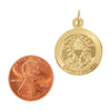 Sterling silver 18K gold PVD Coated "Confirmation" pendant with a penny for scale.