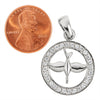 Sterling silver Cubic Zirconia circled dove pendant with a penny for scale.