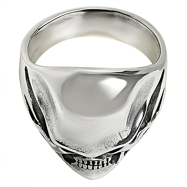 Sterling silver black eyed skull ring at an angle.