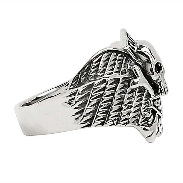 Sterling silver winged skull and crossbones shield ring side view.