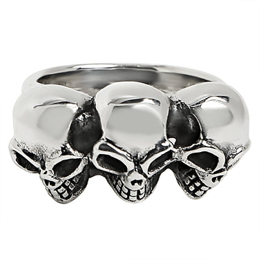 Sterling silver triple back eyed skulls ring angled down.