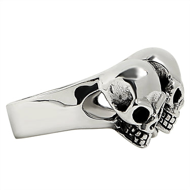 Sterling silver triple back eyed skulls ring side view.