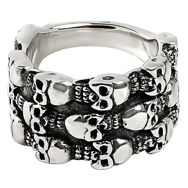 Sterling silver triple layer skulls ring angled down.