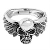 Sterling silver fanged skull with wings ring angled down.