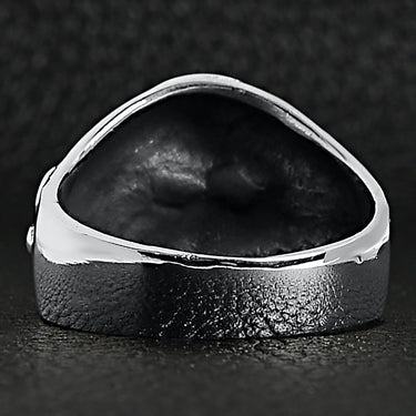 Sterling silver medieval knight warrior skull ring back view on a black leather background.