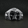 Sterling silver medieval knight warrior skull ringon a black leather background.