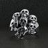 products/SSR0024-Sterling-Silver-Skull-Pile-Ring-Lifestyle-Front.jpg