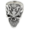 Sterling silver flaming skull ring angled down.