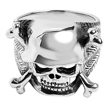 Sterling silver helmet skull and crossbones ring at an angle.