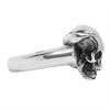 Sterling silver skull in demon hand ring side view.
