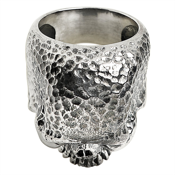 Sterling silver hammered texture skull ring angled down.
