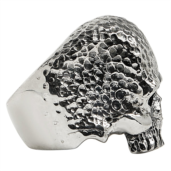 Sterling silver hammered texture skull ring side view.