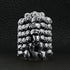 products/SSR0076-Sterling-Silver-Stacked-Skulls-Ring-Lifestyle-Front.jpg