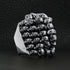 products/SSR0076-Sterling-Silver-Stacked-Skulls-Ring-Lifestyle-Side.jpg