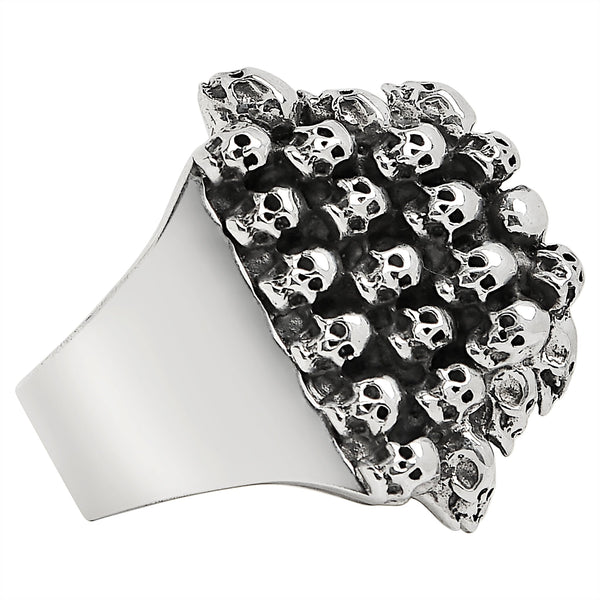 Sterling silver stacked skulls ring side view.